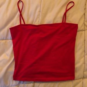 A red bando top with spaghetti straps